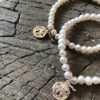 Stretch Freshwater Pearl Bracelet with Sand Dollar by Glee